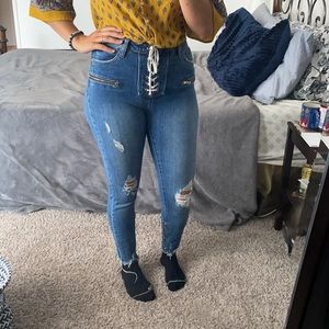 Super cute lace up jeans